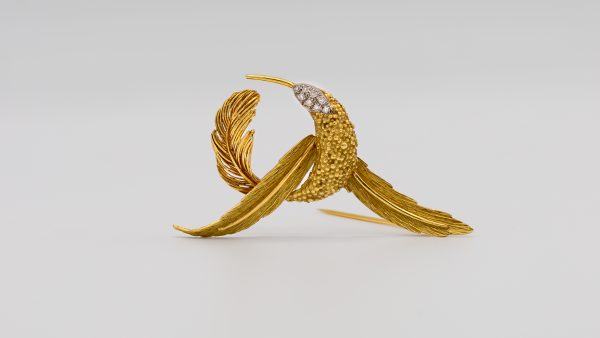 Broche colibri en or jaune et diamants